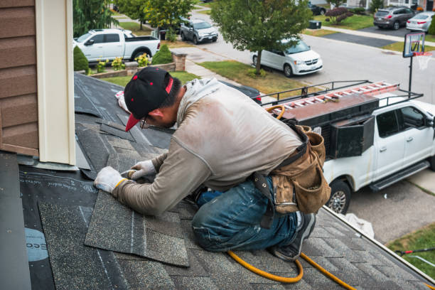Professional Emergency Roof Repair technician working in Illiopolis, IL